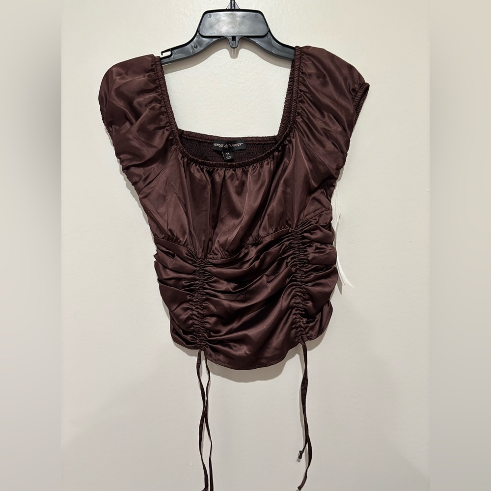 Almost famous top size medium brand new
